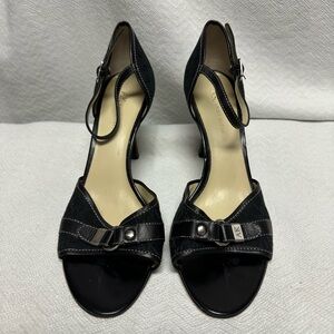 Anne Klein black heels with tasteful signature AK imprinted on shoes size 9